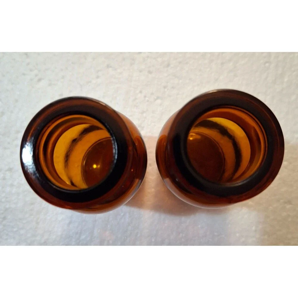 2 W Encircled Amber Glass Bottles 3 3/8